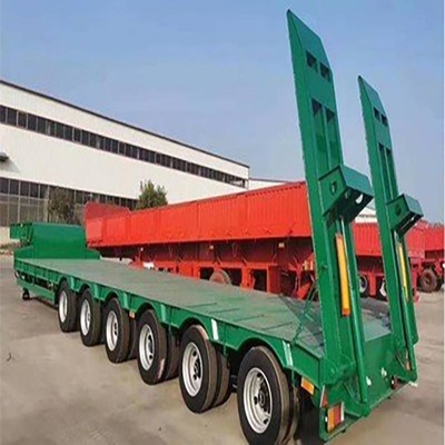 MacPherson-containers met platte bedden en half-aanhangwagens voor het vervoer van zwaar materiaal